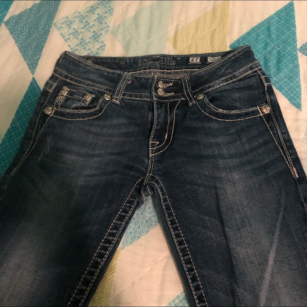 Size 27 Miss Me boot cut, low waisted jeans